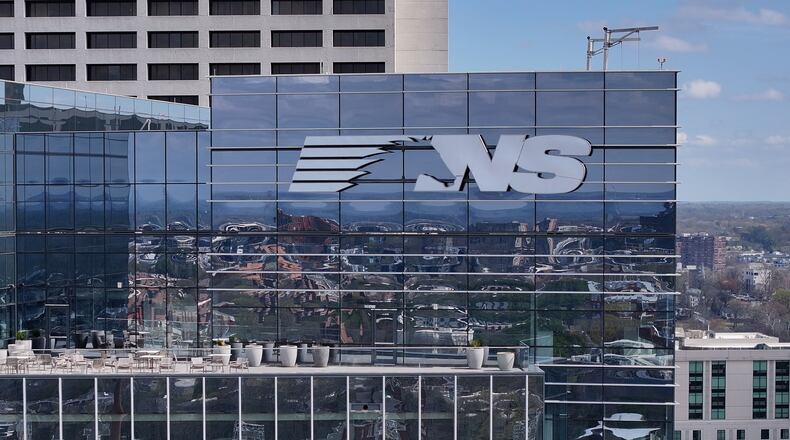 Norfolk Southern headquarters, shown here in an aerial photo on Tuesday, March 10, 2026, sits squarely in the Midtown Atlanta landscape, reflected in its gleaming glass facade. (Hyosub Shin/AJC)