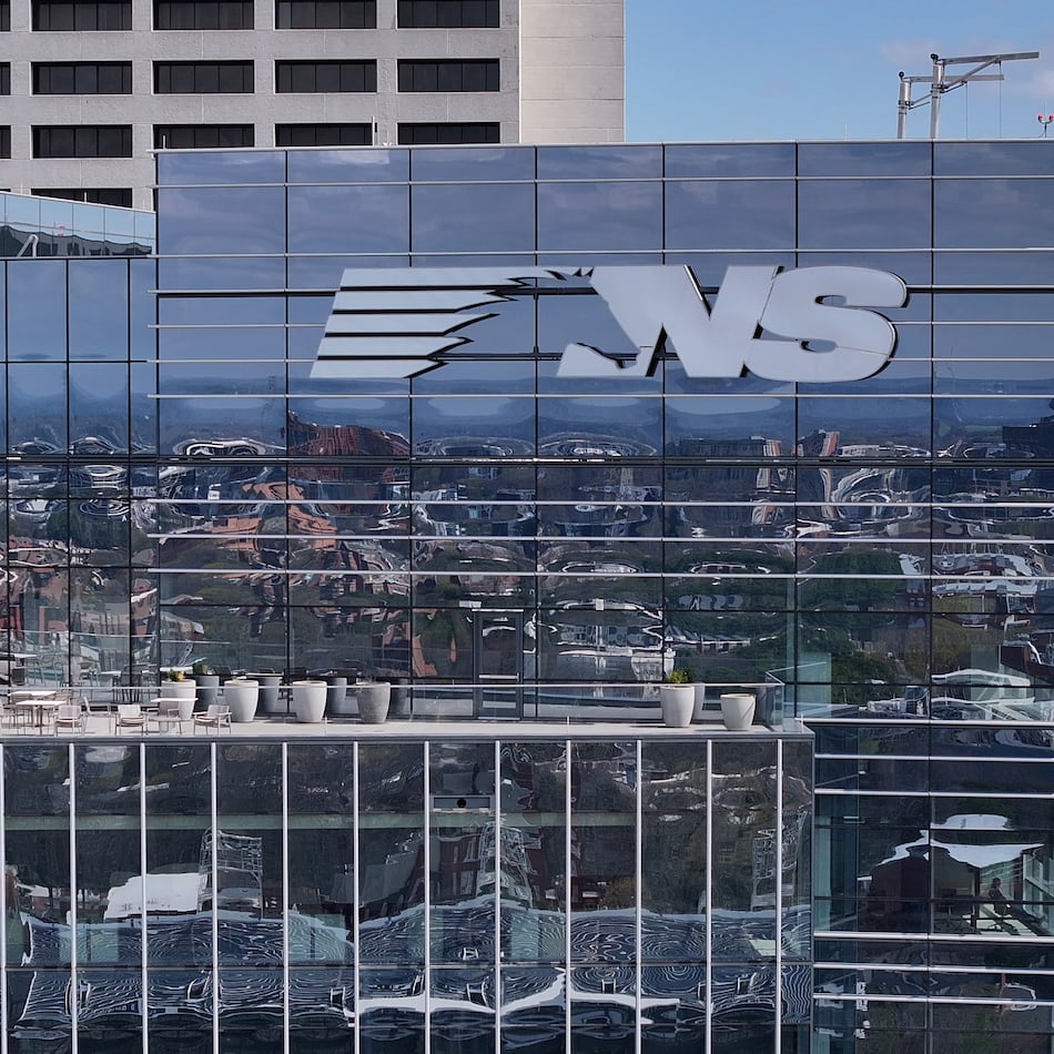 Norfolk Southern headquarters, shown here in an aerial photo on Tuesday, March 10, 2026, sits squarely in the Midtown Atlanta landscape, reflected in its gleaming glass facade. (Hyosub Shin/AJC)