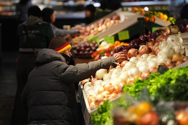 Americans are facing higher prices for many of their groceries this holiday season.(Matt Rourke/AP)