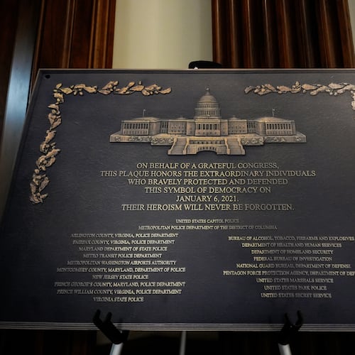 A replica plaque commemorating the Jan. 6, 2021 Capitol riot stands outside the office of House Minority Leader Hakeem Jeffries, D-N.Y, Tuesday, Dec. 30, 2025, at the U.S. Capitol in Washington. (AP Photo/Julia Demaree Nikhinson)