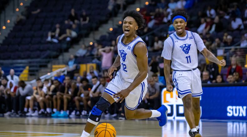 Georgia State's Kane Williams celebrates the victory after his clutch steal.