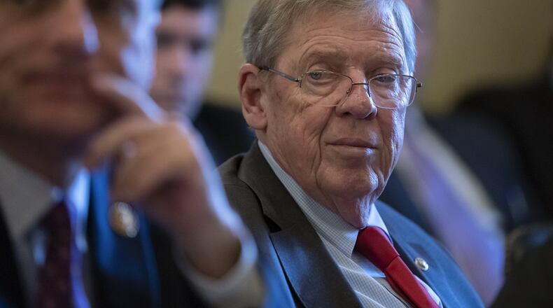 The current divisive climate in the nation’s capital is testing the core principles of Georgia U.S. Sen. Johnny Isakson: his deep loyalty to the Republican Party, his ability to work closely with President Donald Trump and Democrats, and his conservative wariness of executive overreach. (AP Photo/J. Scott Applewhite)