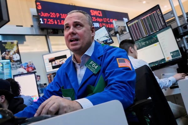 Trader John Flaherty works on the options floor on the floor of the New York Stock Exchange, Thursday, April 10, 2025. (AP Photo/Richard Drew)