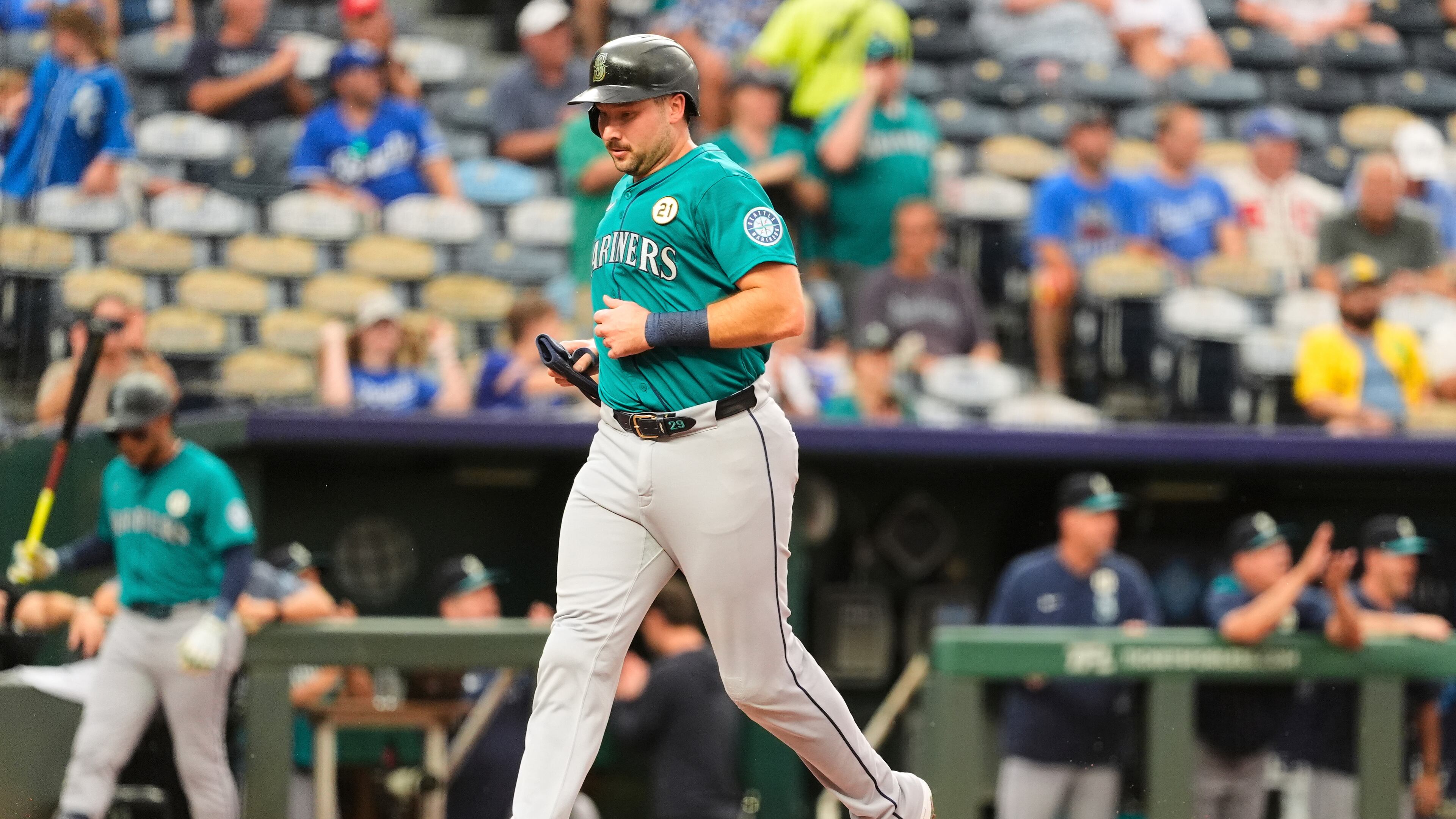 Seattle Mariners' Cal Raleigh runs home to score on a double by Julio Rodriguez during the first inning of a baseball game against the Kansas City Royals, Tuesday, Sept. 16, 2025, in Kansas City, Mo. (AP Photo/Charlie Riedel)
