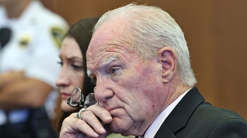 Defense attorney Kevin Reddington and defendant Lindsay Clancy listen to Judge William Sullivan speak with the jury after declaring a mistrial at court in Plymouth, Mass., on Friday, Sept. 4, 2026. (Greg Derr/The Patriot Ledger via AP, Pool)