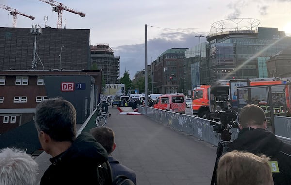 Emergency services at the scene of a stabbing at Hamburg Central Station in Hamburg, Germany, Friday, May 23, 2025. (Lukas Mueller/dpa via AP)