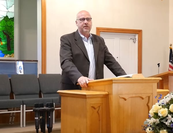 Bradley Reynolds was hired as a vice president at Truett McConnell University when Hayle Swinson was a student. After she graduated she worked in various jobs at the college including life coach reporting to Reynolds. He is seen here in 2022 delivering the pastor's message at Dewberry Baptist Church in Gainesville. (Screenshot from YouTube)