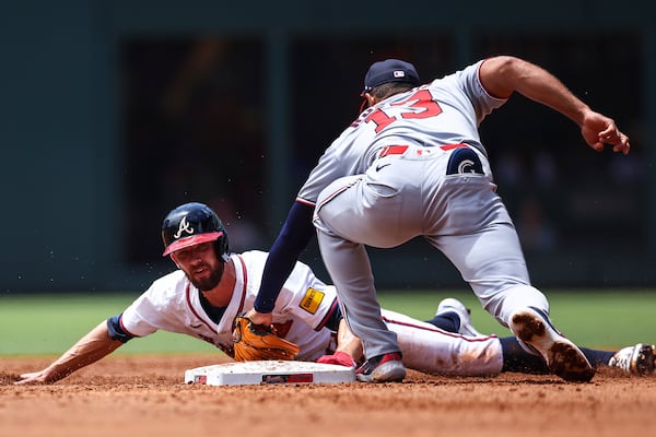 Atlanta Braves' Eli White steals second base in the third inning of a baseball game against the Washington Nationals, Thursday, May 15, 2025, in Atlanta. (AP Photo/Colin Hubbard)