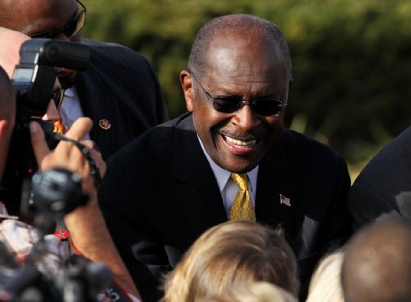Herman Cain suspends presidential campaign