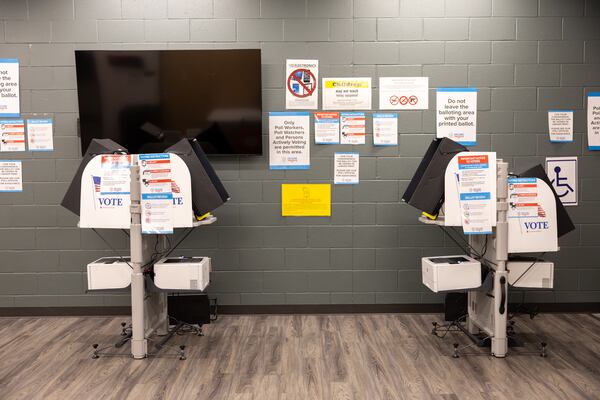 Voting machines for a runoff special election appear at the L.B. “Buzz” Ahrens Recreation Center in Canton in January. (Arvin Temkar/AJC)