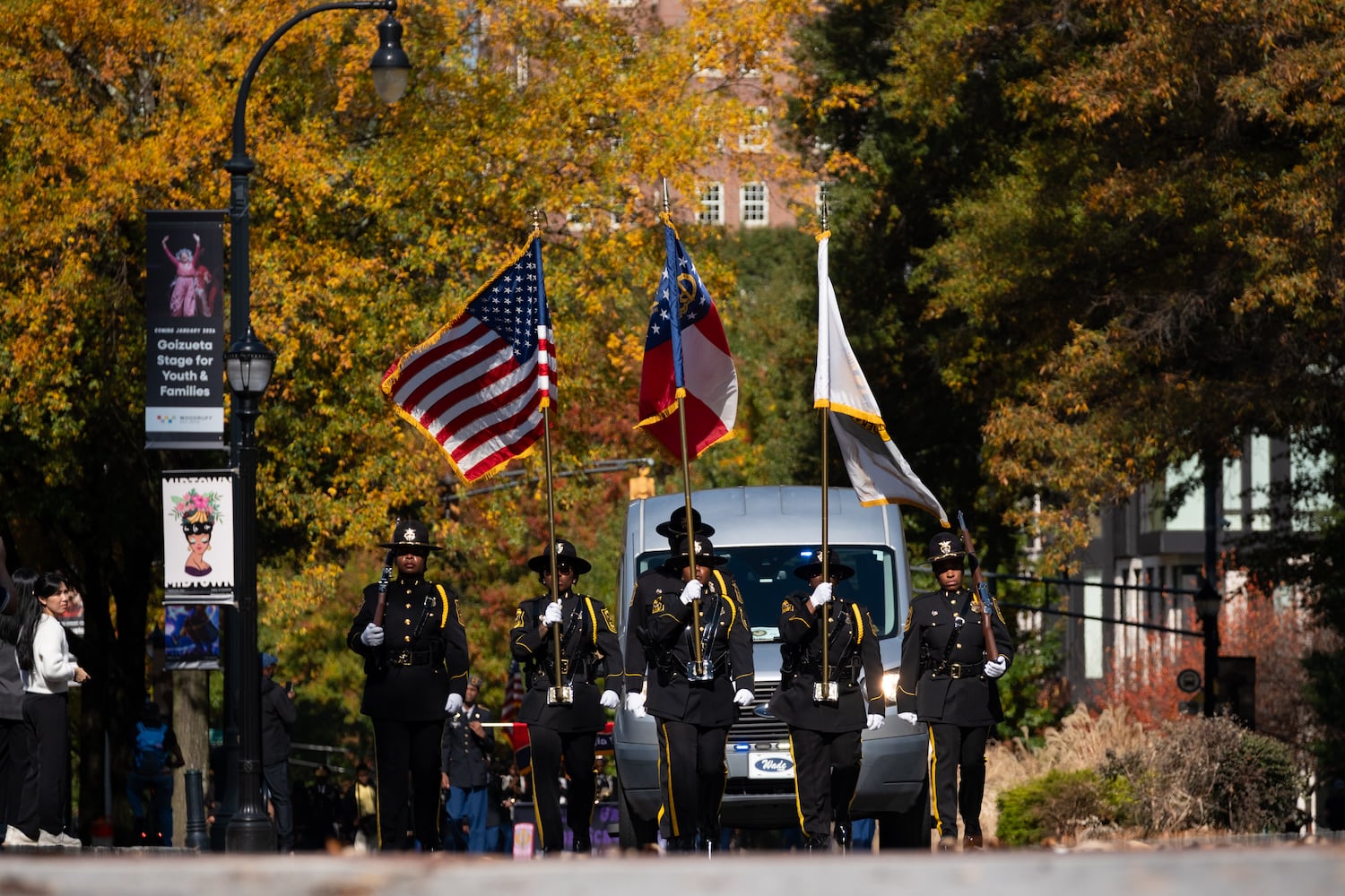 The DeKalb Police honor guard marches down Peachtree Street while participating in the Georgia Veterans Day Parade in Midtown Atlanta on Saturday, Nov. 8, 2025.   Ben Gray for the Atlanta Journal-Constitution