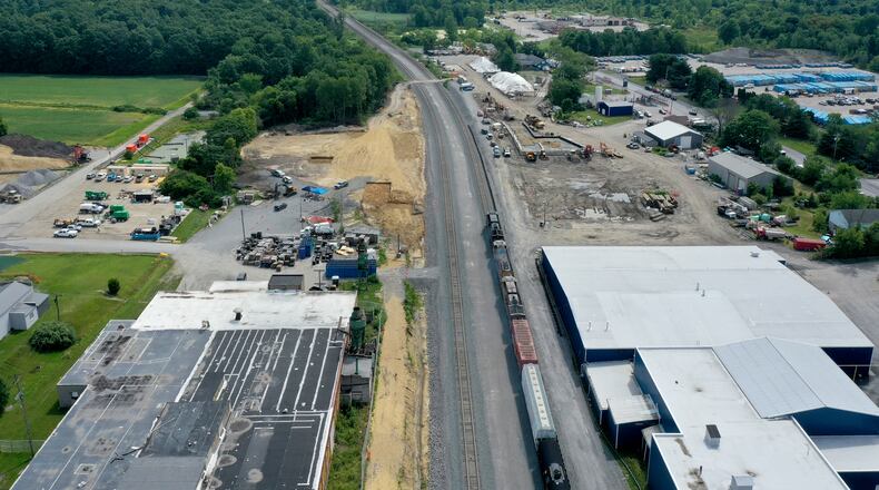 An aerial photo shows cleanup and remediation continuing on the site of the Feb. 3 Norfolk Southern freight train derailment, Saturday, July 15, 2023, in East Palestine. (Matt Freed for The Atlanta Journal-Constitution)