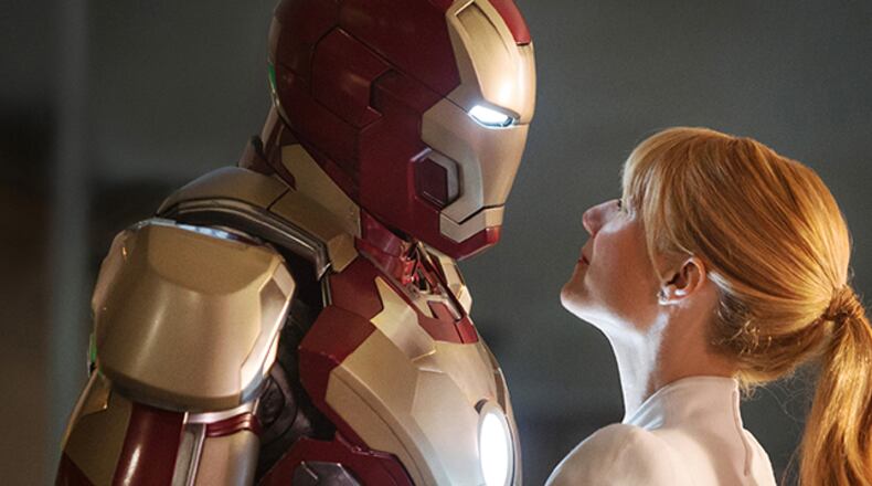 This film publicity image released by Disney-Marvel Studios shows Robert Downey Jr., left, as Tony Stark/Iron Man and Gwyneth Paltrow as Pepper Potts in a scene from "Iron Man 3." (AP Photo/Disney, Marvel Studios)