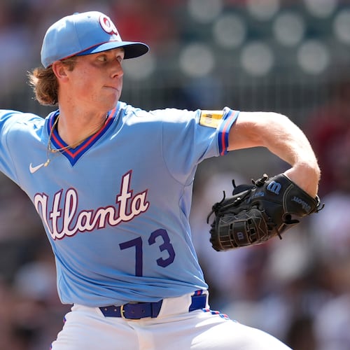 Atlanta Braves pitcher Owen Murphy (73) works against the Texas Rangers in the second inning of a baseball game, Saturday, July 18, 2026, in Atlanta. (AP Photo/Mike Stewart)