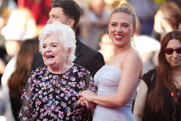 June Squibb, left, and Scarlett Johansson pose for photographers upon arrival at the premiere of the film 'A Private Life' at the 78th international film festival, Cannes, southern France, Tuesday, May 20, 2025. (Photo by Scott A Garfitt/Invision/AP)