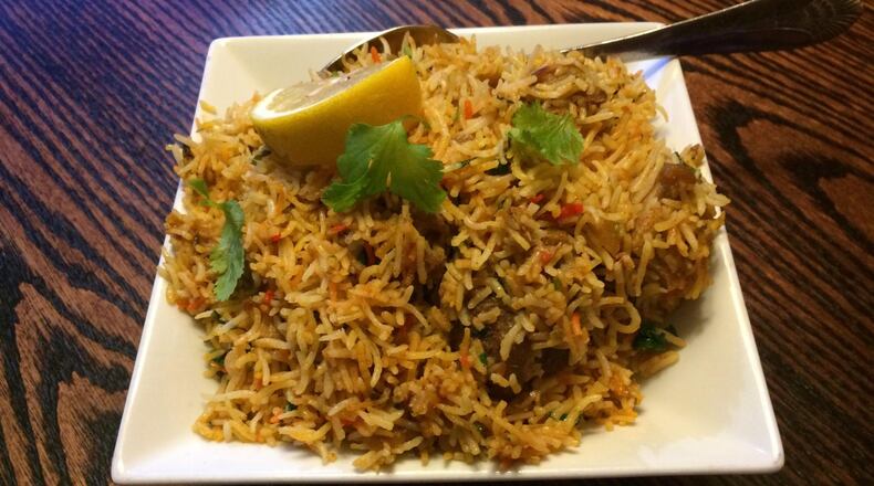 Kennesaw’s Pinch of Spice serves many kinds of biryani, including this one with goat. CONTRIBUTED BY WENDELL BROCK