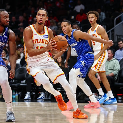Atlanta Hawks forward Zaccharie Risacher, center, drives to the basket during the first half of an NBA basketball game against the Orlando Magic, Tuesday, Nov. 4, 2025, in Atlanta. (Colin Hubbard/AP)
