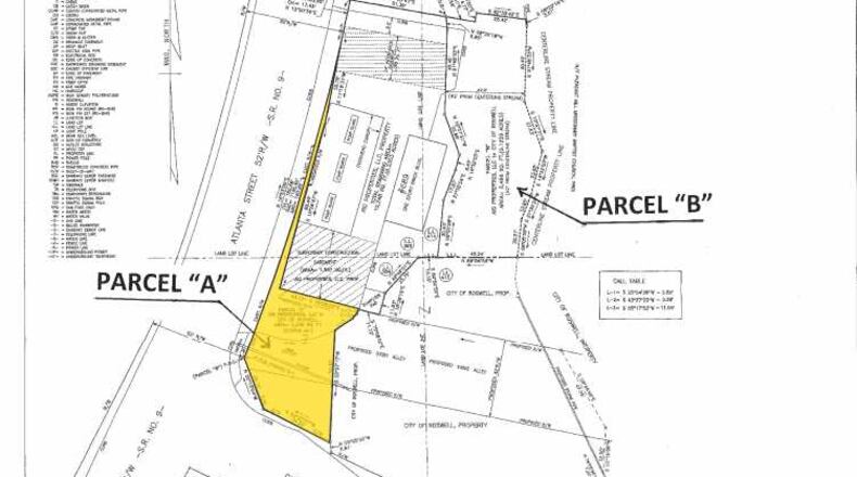 Roswell will pay $380,000 for 0.2 acres of land on Atlanta Street as part of its Oxbo Road realignment project. The shaded yellow area shows the plot of land the city is buying.
