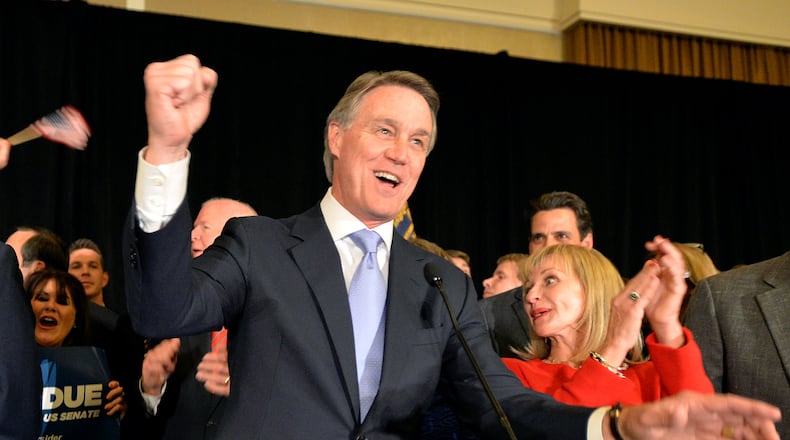 November 4, 2014 Atlanta - Republican candidate for U.S. Senate David Perdue speaks during his election night party at the InterContinental Buckhead in Atlanta on Tuesday, November 4, 2014. Republican David Perdue, a businessman who was virtually unknown in political circles just 18 months ago, will be Georgia's next United States senator. HYOSUB SHIN / HSHIN@AJC.COM Republican candidate for U.S. Senate David Perdue speaks during his election night party at the InterContinental Buckhead in Atlanta on Tuesday. (AJC/Hyosub Shin)