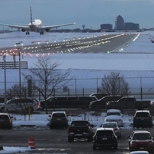 An American airplane arrives at the O'Hare International Airport in Chicago, Sunday, Nov. 30, 2025. (AP Photo/Nam Y. Huh)