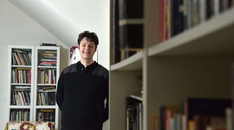 Ilya Kaminsky, a native of Odessa, Russia, is a newly arrived poetry professor at Georgia Tech and head of the Poetry @ Tech program. Inspired in part by his hearing loss, his new collection, “Deaf Republic,” was published this month. HYOSUB SHIN / HSHIN@AJC.COM