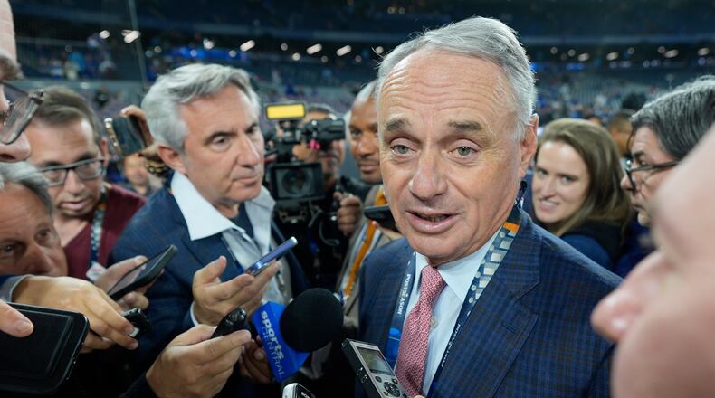 MLB commissioner Rob Manfred speaks prior to Game 2 of baseball's World Series between the Toronto Blue Jays and the Los Angeles Dodgers, Saturday, Oct. 25, 2025, in Toronto. (AP Photo/David J. Phillip)