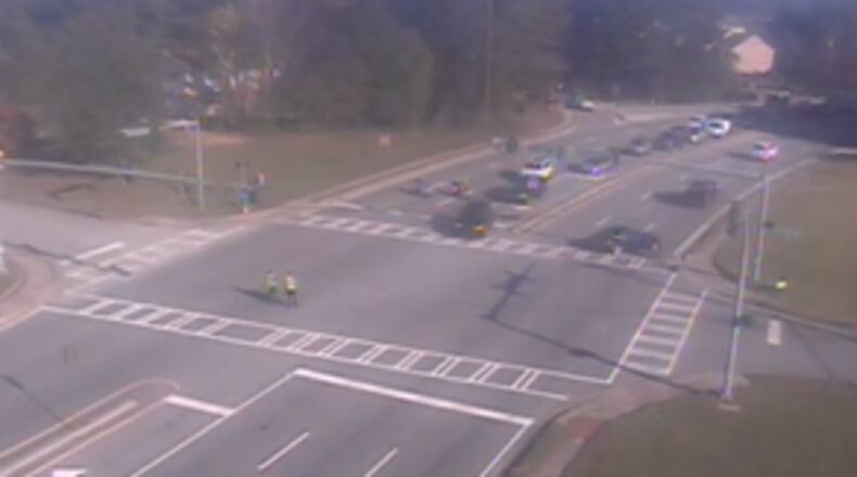 Pleasant Hill Road was shut down Friday afternoon as Gwinnett County police investigated a fatal crash.