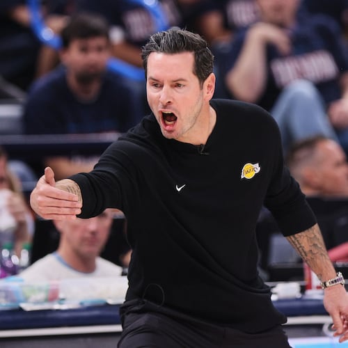 Los Angeles Lakers head coach JJ Redick reacts to play against the Oklahoma City Thunder in the second half of Game 2 in a second-round NBA basketball playoffs series Thursday, May 7, 2026, in Oklahoma City. (AP Photo/Nate Billings)