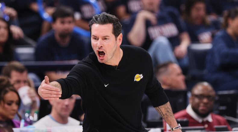 Los Angeles Lakers head coach JJ Redick reacts to play against the Oklahoma City Thunder in the second half of Game 2 in a second-round NBA basketball playoffs series Thursday, May 7, 2026, in Oklahoma City. (AP Photo/Nate Billings)