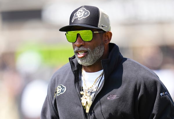 Colorado head coach Deion Sanders warms up during an NCAA college football spring game, Saturday, April 19, 2025, in Boulder, Colo. (AP PhotoJack Dempsey)