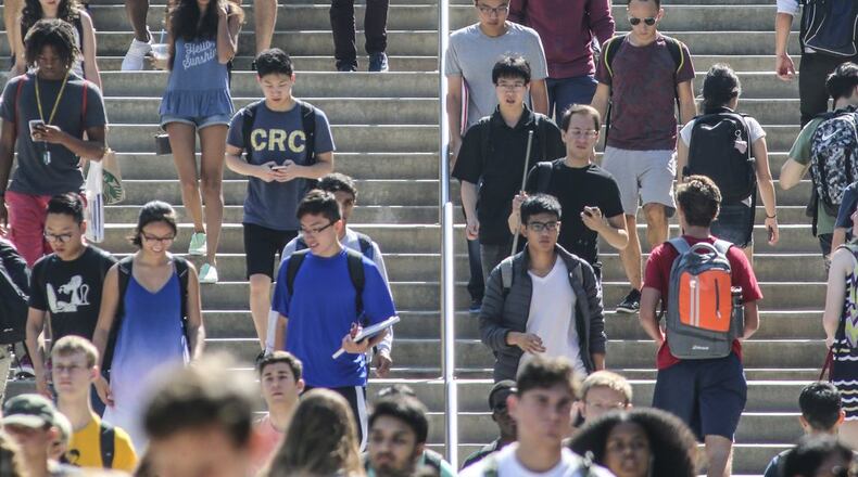 Atlanta: Georgia Tech students walk the stairs leading to the Tech Walkway on the first day of school on Monday, Aug. 21, 2017. JOHN SPINK/JSPINK@AJC.COM