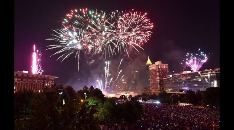 Fireworks light up the downtown Atlanta skyline.