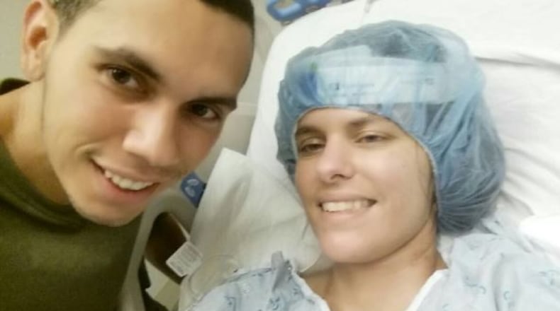 Police officer David Martinez and wife Cindy Martinez, the Gwinnett County woman hospitalized due to an infection from flesh-eating bacteria. (Credit: Family photo)