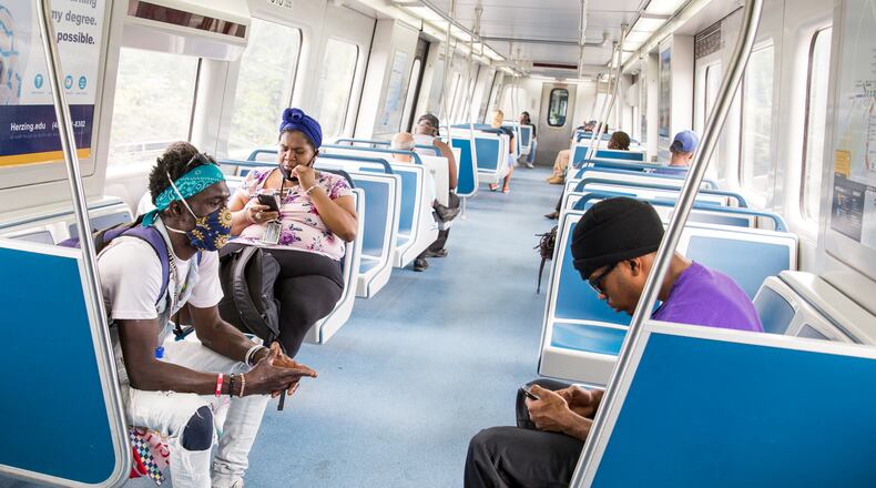 MARTA believes only about half its customers wear masks. But agency officials are reluctant to require masks for fear of provoking confrontations between employees and passengers. (Jenni Girtman for The Atlanta Journal-Constitution)