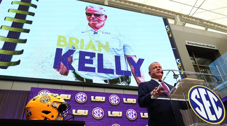 LSU coach Brian Kelly takes questions during his news conference at SEC Media Days on Monday at the College Football Hall of Fame in Atlanta. (Curtis Compton / Curtis Compton@ajc.com)