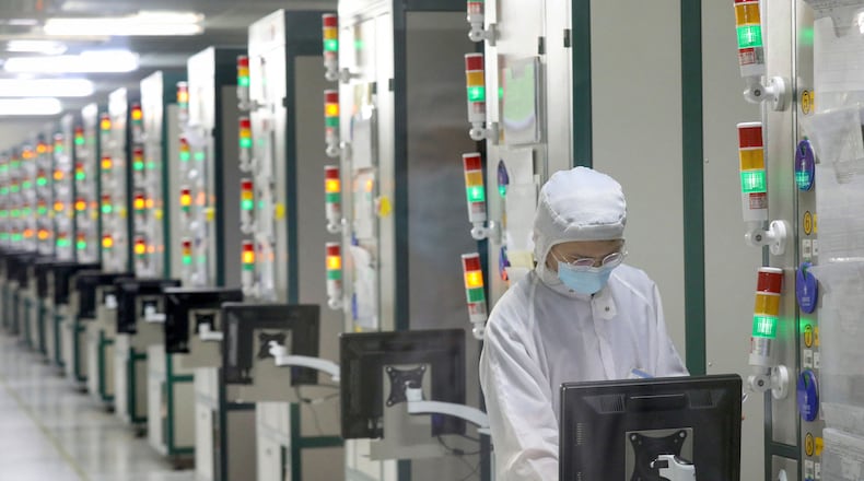 An employee works at a factory of Jiejie Semiconductor Company in Nantong, in eastern China's Jiangsu province, on March 17, 2021. (AFP/Getty Images/TNS)