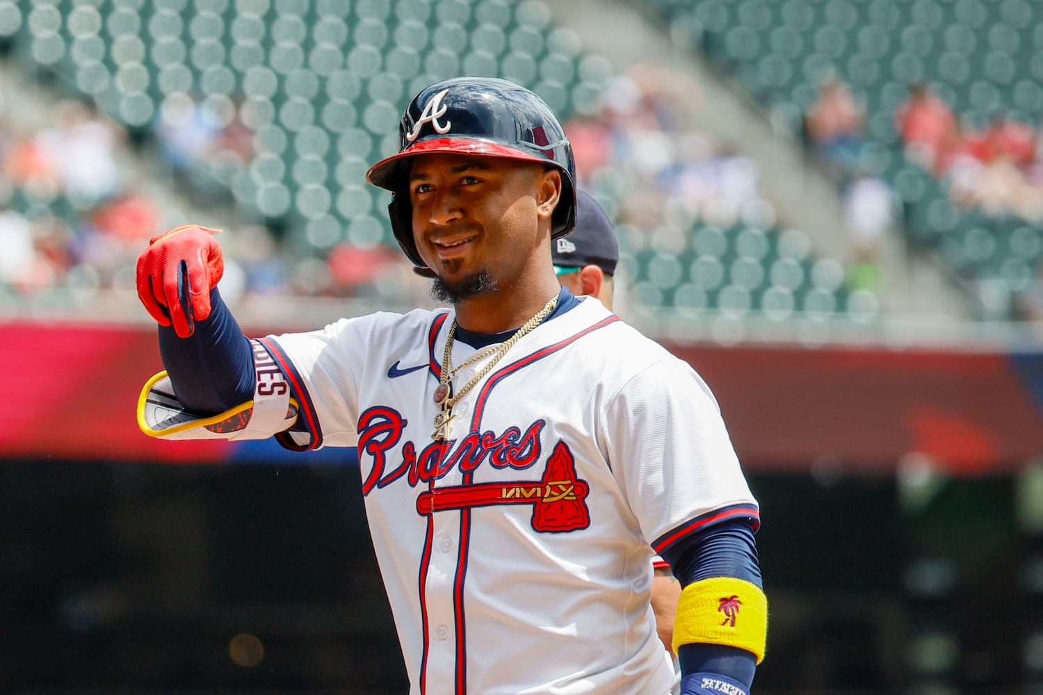 Atlanta Braves second base Ozzie Albies (1) signals to the temmates after hitting a single during the first inning against the Minnesota Twins at Truist Park on Sunday, April 20, 2025, in Atlanta. 
(Miguel Martinez/ AJC)