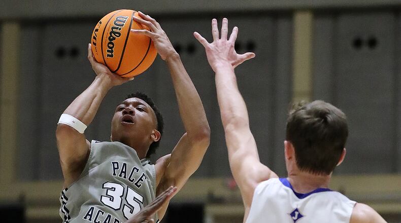 Pace Academy's Matthew Cleveland shoots over a Jefferson defender in the Class AAA boys state basketball championship Thursday, March 5, 2020, in Macon.