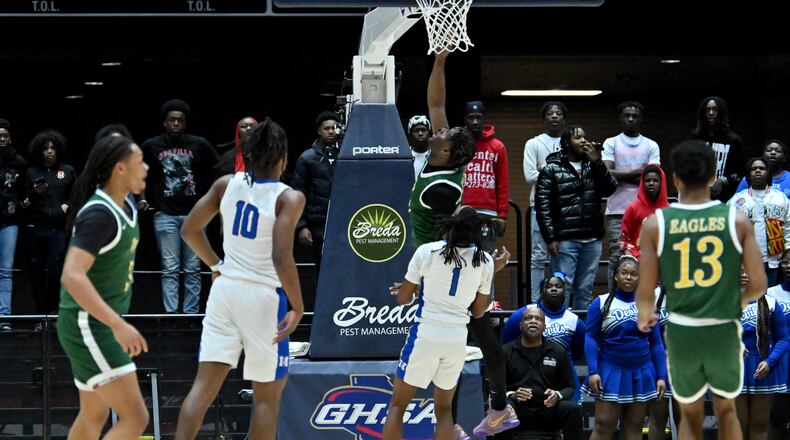 Greenforest's Russ White (3) goes to the basket for a shot during the first half of GHSA Basketball Class A Division II Boy’s State Championship game at the Macon Centreplex, Wednesday, Mar. 6, 2024, in Macon. (Hyosub Shin / Hyosub.Shin@ajc.com)