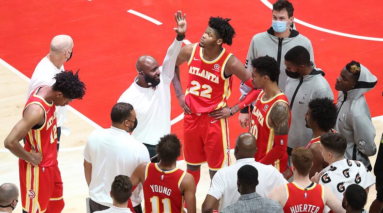 122820 ATLANTA: Atlanta Hawks head coach Lloyd Pierce coaches up his team against the Detroit Pistons in a NBA basketball game on Monday, Dec. 28, 2020, in Atlanta.  “Curtis Compton / Curtis.Compton@ajc.com”
