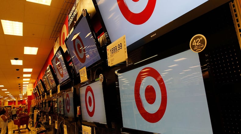 Flat-screen televisions with the Target logo are displayed in Target's Harlem store August 18, 2010 in New York City.