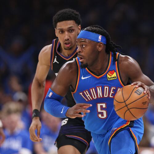 Oklahoma City Thunder guard Luguentz Dort leads a fast break in front of Phoenix Suns forward Ryan Dunn during the second half in Game 1 of a first-round NBA playoffs basketball series Sunday, April 19, 2026, in Oklahoma City. (Nate Billings/AP)