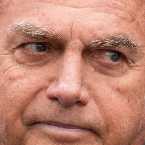 FILE - Former President Jair Bolsonaro, temporarily allowed out of house arrest for medical treatment, departs a hospital in Brasilia, Brazil, Sept. 14, 2025. (AP Photo/Eraldo Peres, File)
