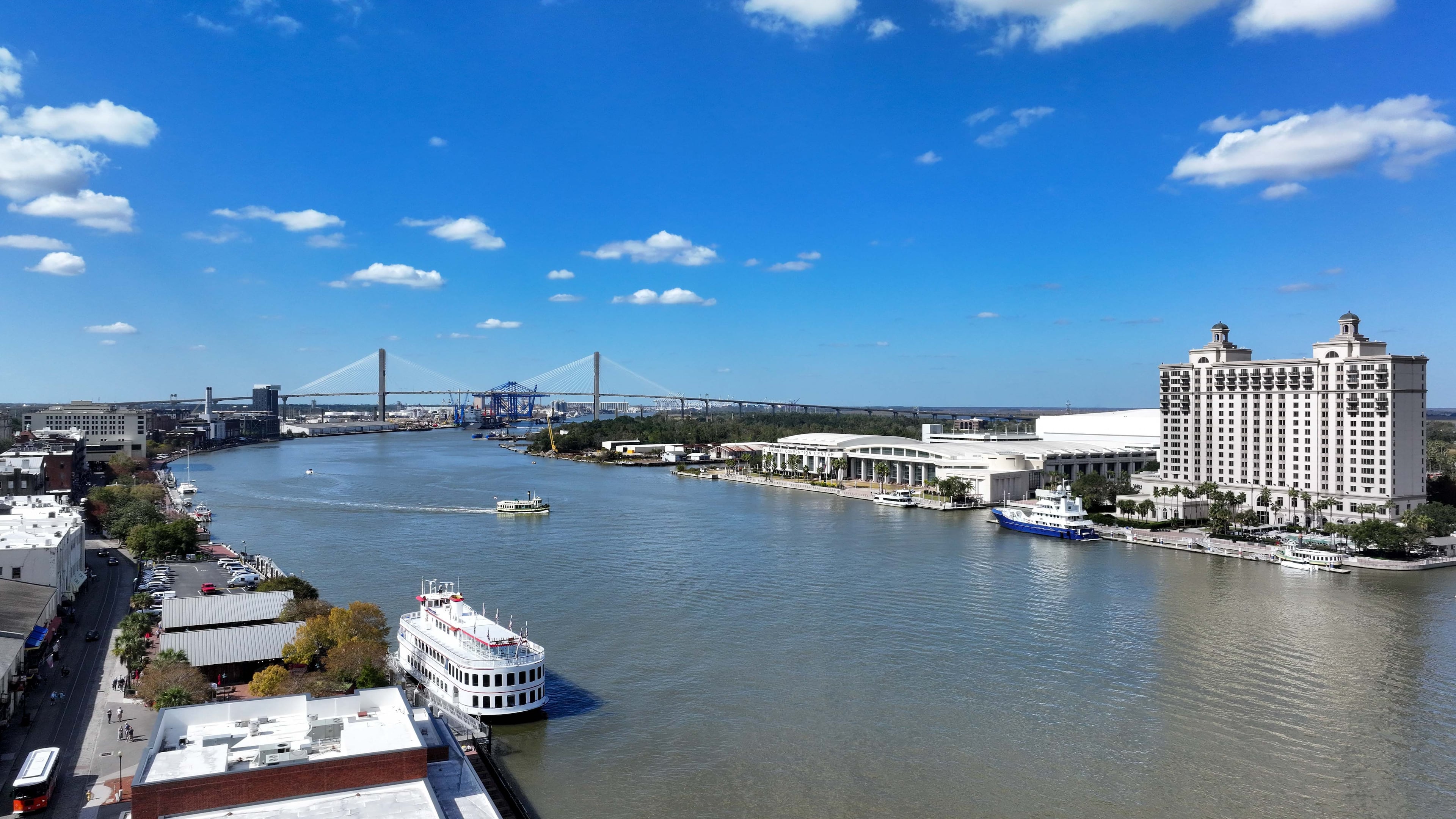 The historic downtown area of Savannah is pictured on the left side of the Savannah River, across from the Savannah Convention Center, which doubled in capacity after a $276 million expansion was finished earlier this year. An inlet near the convention center called Slip 3 is where the NS Savannah could reside. (Miguel Martinez / AJC 2024)