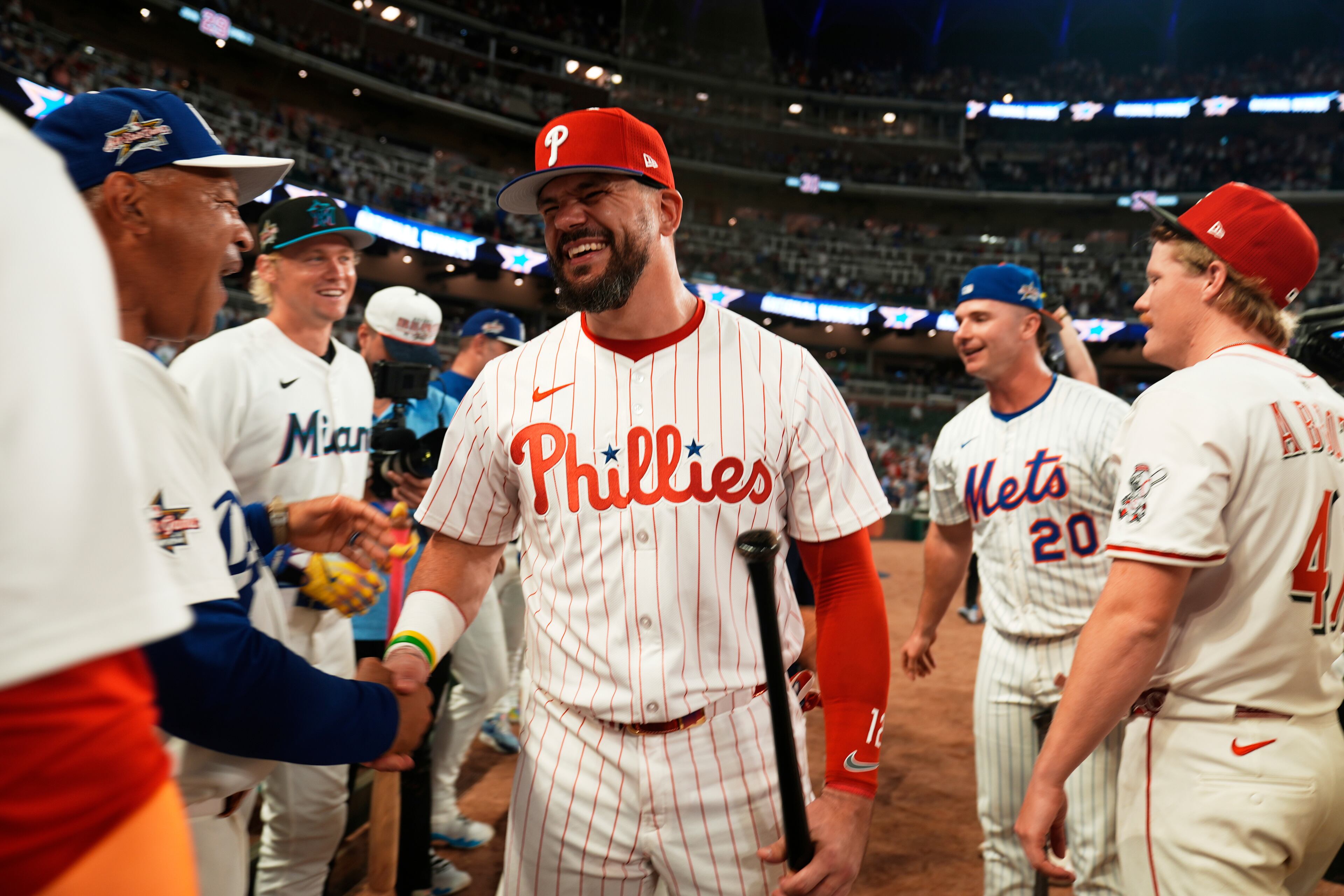 Philadelphia Phillies Kyle Schwarber celebrates after winning the tiebreaker at the MLB All-Star Game. (Brynn Anderson/AP)