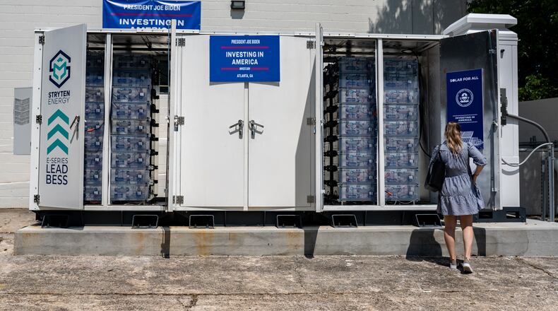 The Stryten Energy battery bank sits behind the community center. Atlanta Mayor Andre Dickens is joined Representative Nikema Williams and EPA administrator Michael Regan at the Vicars Community Center in West Atlanta. Leaders gathered to tour and speak about new solar panels and batteries installed via a federal grant. Wednesday, July 31, 2024 (Ben Hendren for the Atlanta Journal-Constitution)