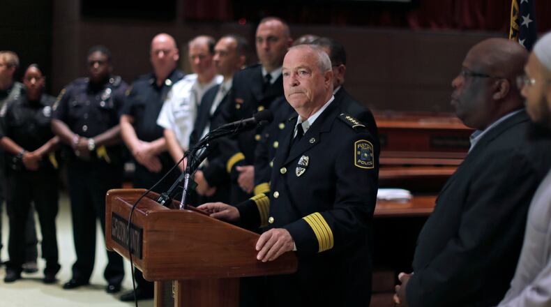 Police Chief Gary Stiles is at the podium at a July briefing where he talks about police shootings. BOB ANDRES / BANDRES@AJC.COM AJC File Photo