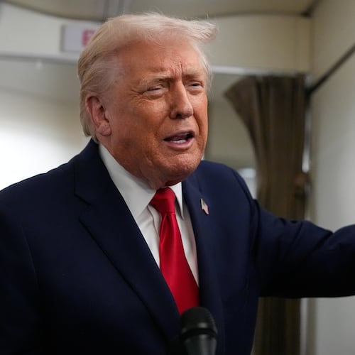 President Donald Trump speaks with reporters while in flight on Air Force One from Joint Base Andrews to Avoca, Pa., Tuesday, Dec. 9, 2025. (AP Photo/Alex Brandon)