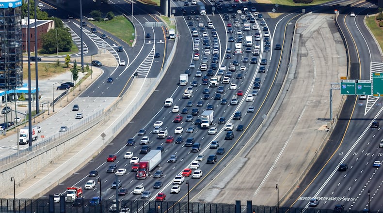 Traffic forms along the Downtown Connector on Wednesday, Aug. 26, 2026, in Atlanta. The leeway we afford others on the road by putting ourselves second is world changing and lifesaving, Doug Turnbull writes. (Arvin Temkar/AJC)