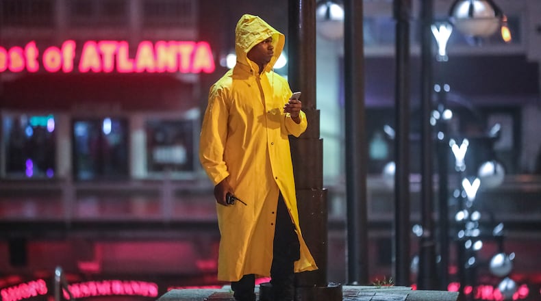 Underground security guard, Derrick Mallett came dressed for the weather on Wednesday, Oct. 28, 2020. Georgia could experience torrential rain, damaging wind gusts in excess of 44 mph and even tornadoes, he said. Several metro Atlanta counties along Zeta’s predicted track are under a tropical storm watch, which has not been issued locally since Irma and Nate during the 2017 hurricane season. “We’re going to have a three- to four-hour window let’s say about 4 a.m. tomorrow morning to about 8 a.m. tomorrow morning where the weather is going to be really tough around here,” Channel 2 Action News meteorologist Brian Monahan said. “That’s going to be timed right through your morning commute.” Those north of I-20 will see the most impacts from the system, he said. According to Channel 2, up to four inches of rain could fall on the Northside by the end of the day Thursday. Monahan said Zeta will be rough on Georgia, but it will be brief. “It blasts on through,” he said. “By 8, 9 a.m. tomorrow morning, the worst of the rain has passed.” (John Spink / John.Spink@ajc.com)